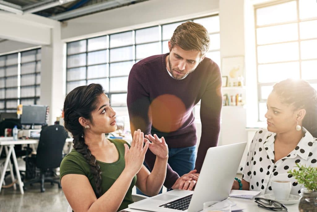 Digital marketing team working together explain customer problem to each other